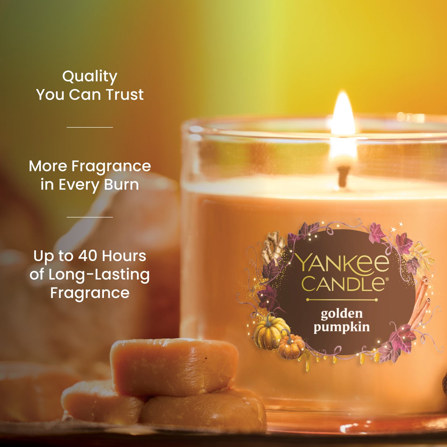 Pumpkin scented candle in glass jar with long-lasting fragrance, quality burn, and wax melts nearby.